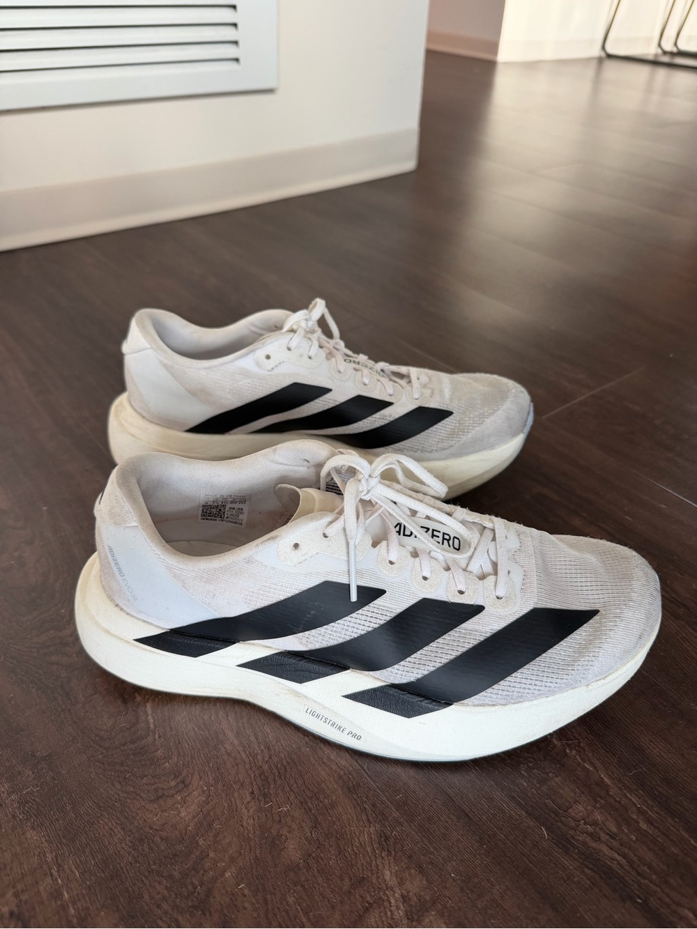 adidas Adizero Women’s Athletic Shoes in White and Black
